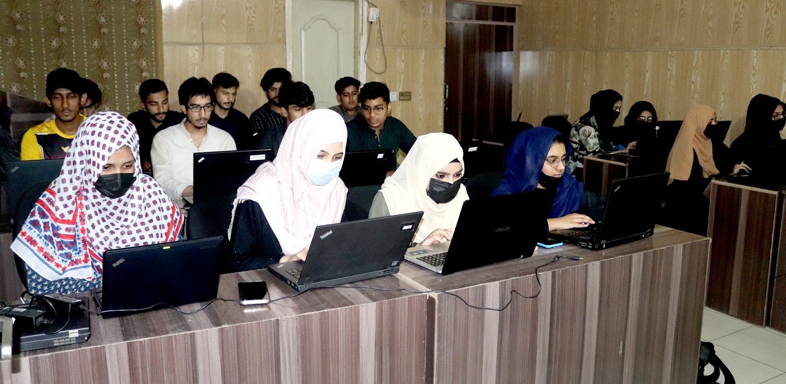 Graphic Designing Course in Lahore students learning Photoshop